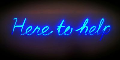 neon sign in blue , here to help